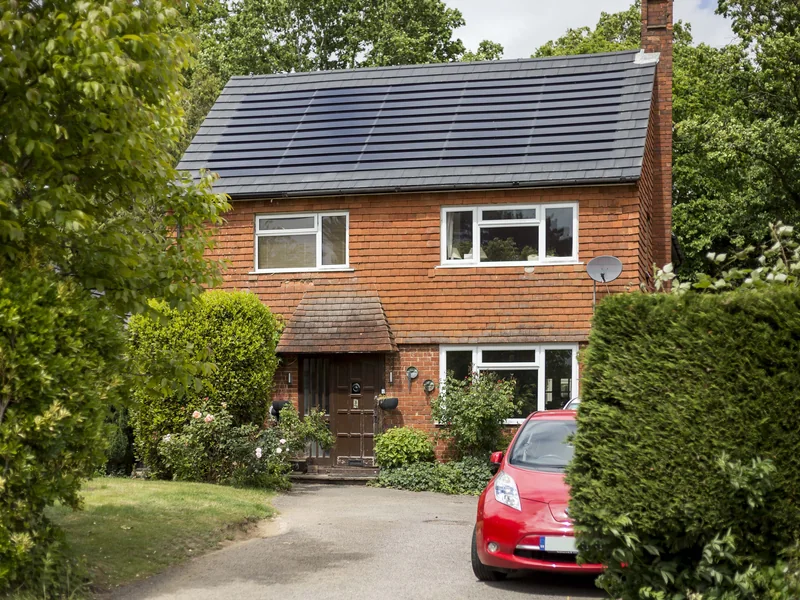 Completed grey SolarTyle roof on a detached Guildford home
