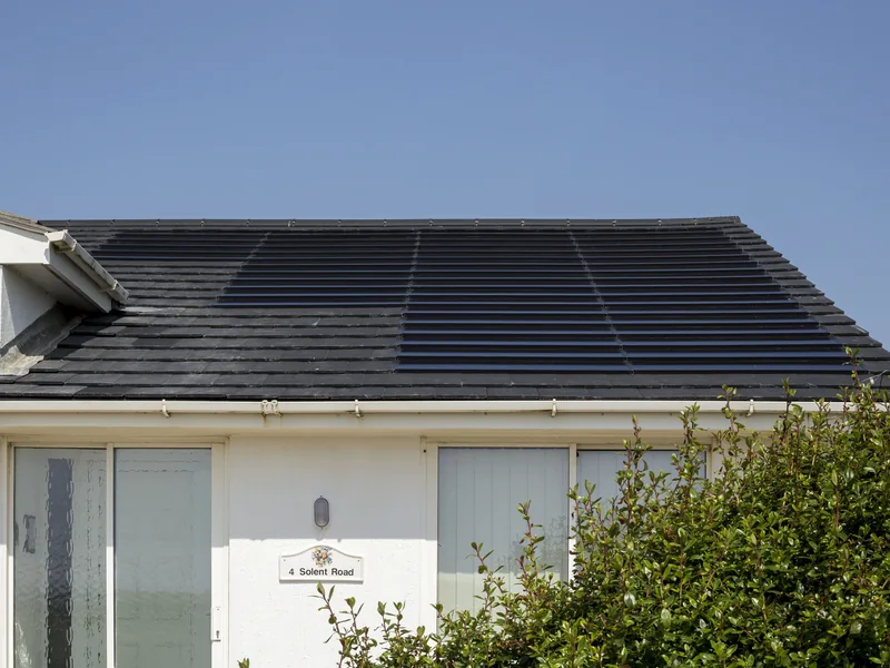 Close view of a flush black SolarTyle roof installation
