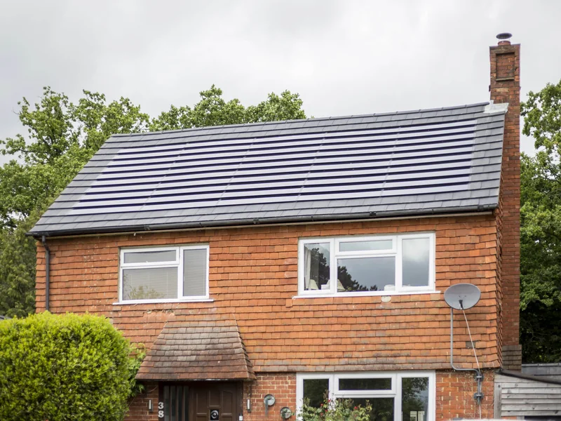 Completed grey SolarTyle roof on an established Guildford home