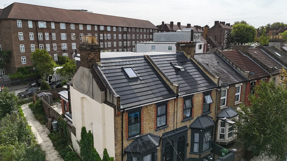 Integrated solar roof elevations on the two Hackney homes