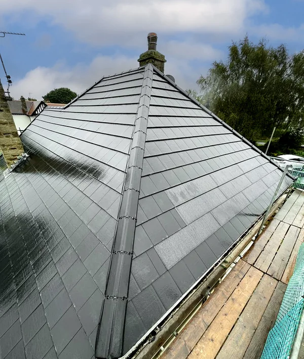 Closer view of the hipped roof and SolarTyle finish