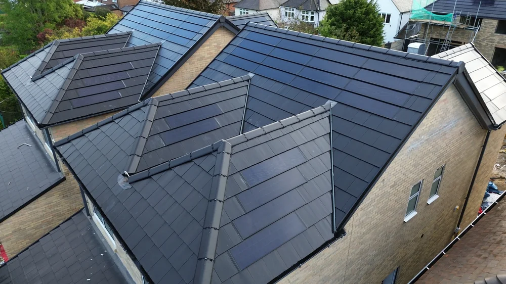 Close-up of SolarTyle courses beside the roof hip