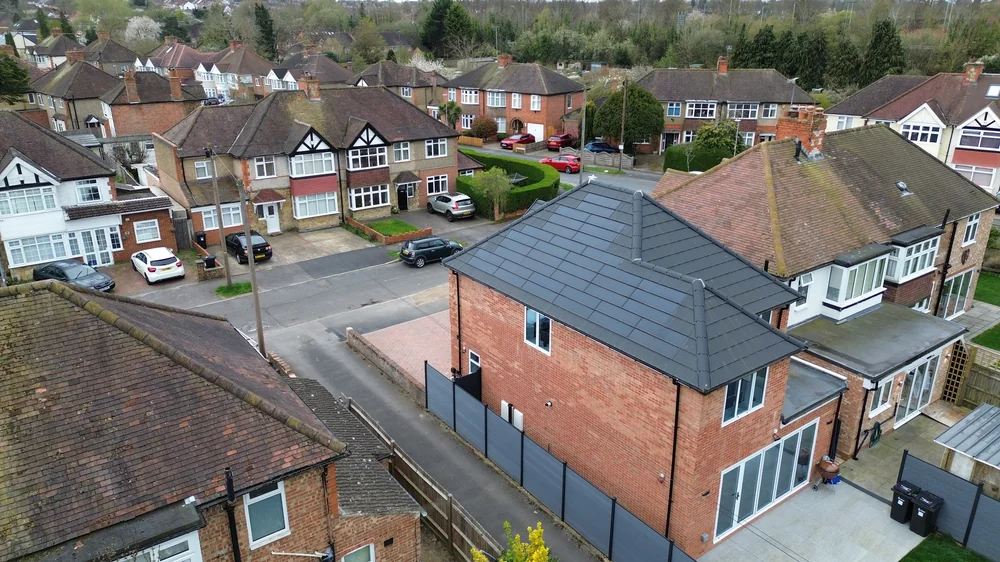 Aerial view of the hipped roof and adjoining roof sections