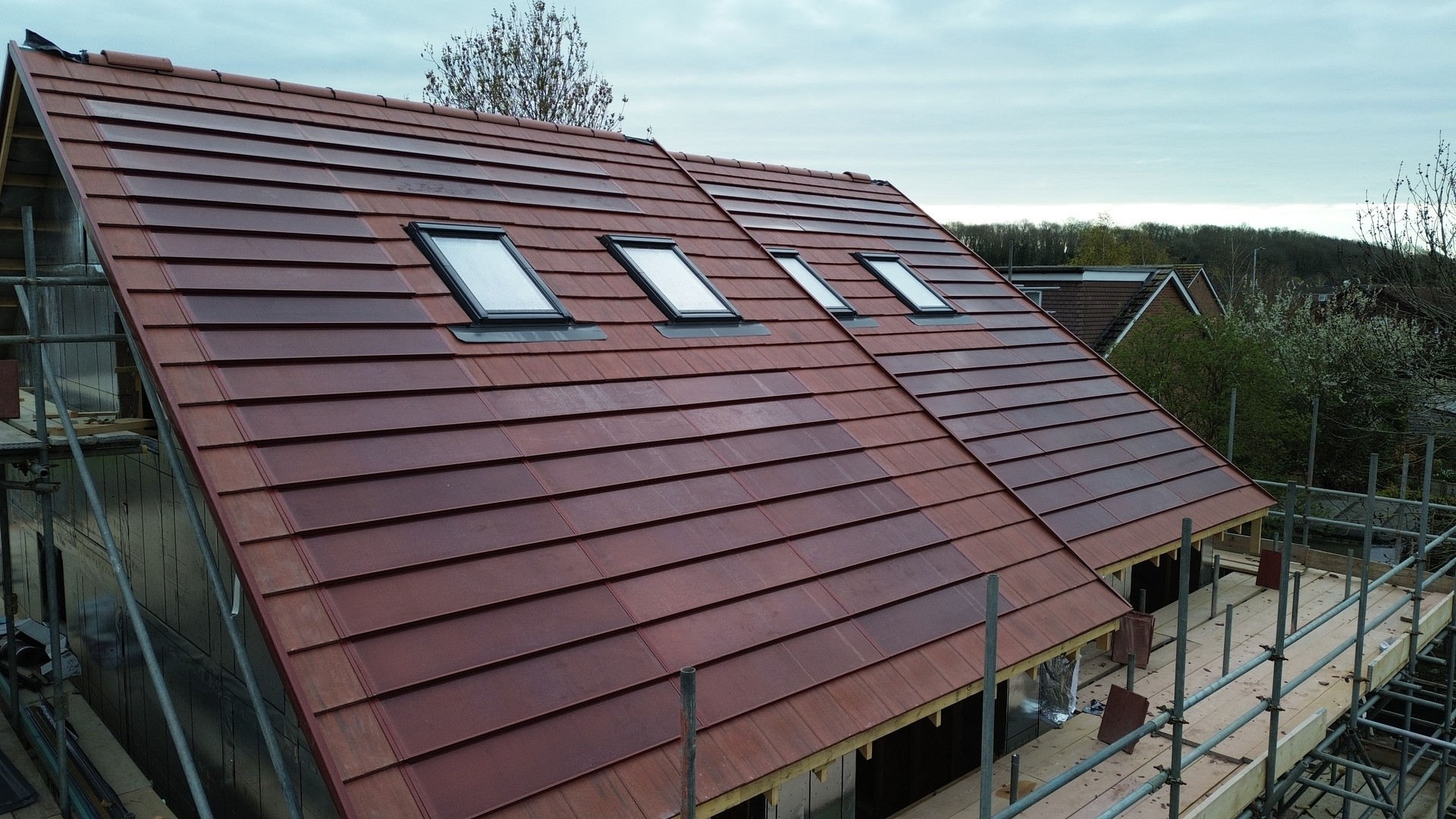 Salford Drive integrated red SolarTyle roof