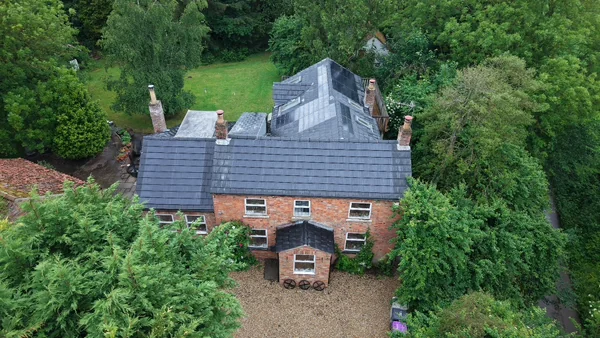 Wider aerial view of the cottage roof layout