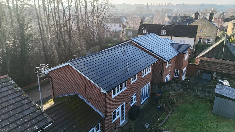 Aerial view of the anthracite SolarTyle roof at Orchard Close in Ware
