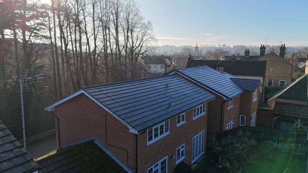 Second aerial view of the Orchard Close roof and red-brick property