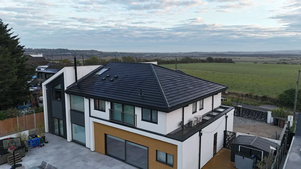 A contemporary home with a completed integrated SolarTyle roof