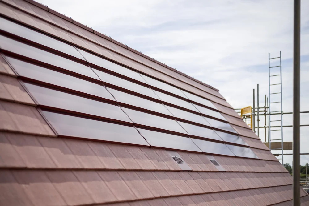 Close-up of real red SolarTyle modules and the surrounding roof tiles
